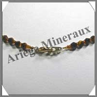 OEIL DE TIGRE - Collier Perles Facetes 4  12 mm en dgrad - 43 cm - A004